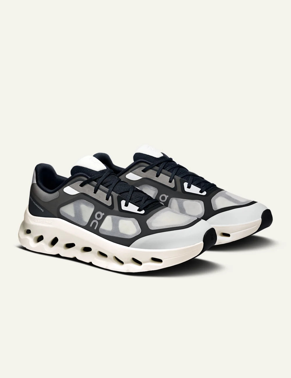 On Cloudtilt Remix Black Ivory sneakers with CloudTec Phase cushioning angled