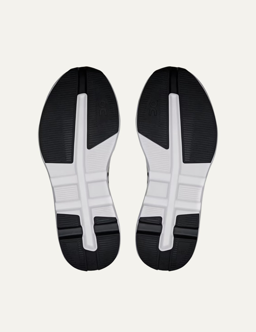 On Cloudzone sneakers in ice and black with breathable upper and CloudTec cushioning sole