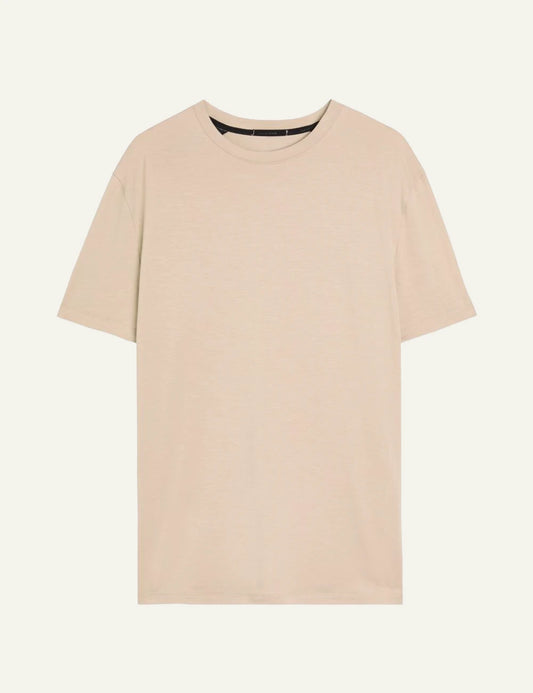 On beige cotton T-shirt close-up shoulder front