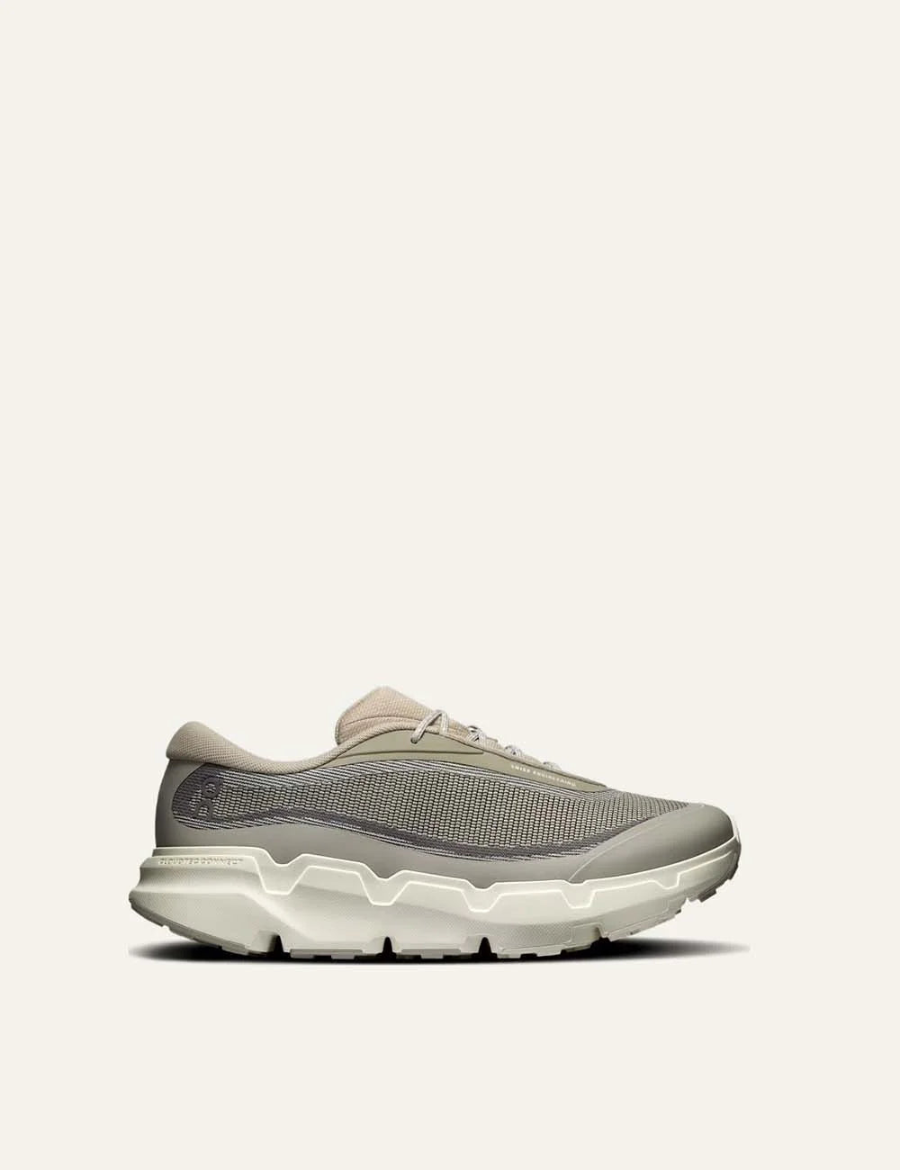 On men's beige and grey hiking sneakers with mesh upper, CloudTec Connect cushioning and Missiongrip outsole.