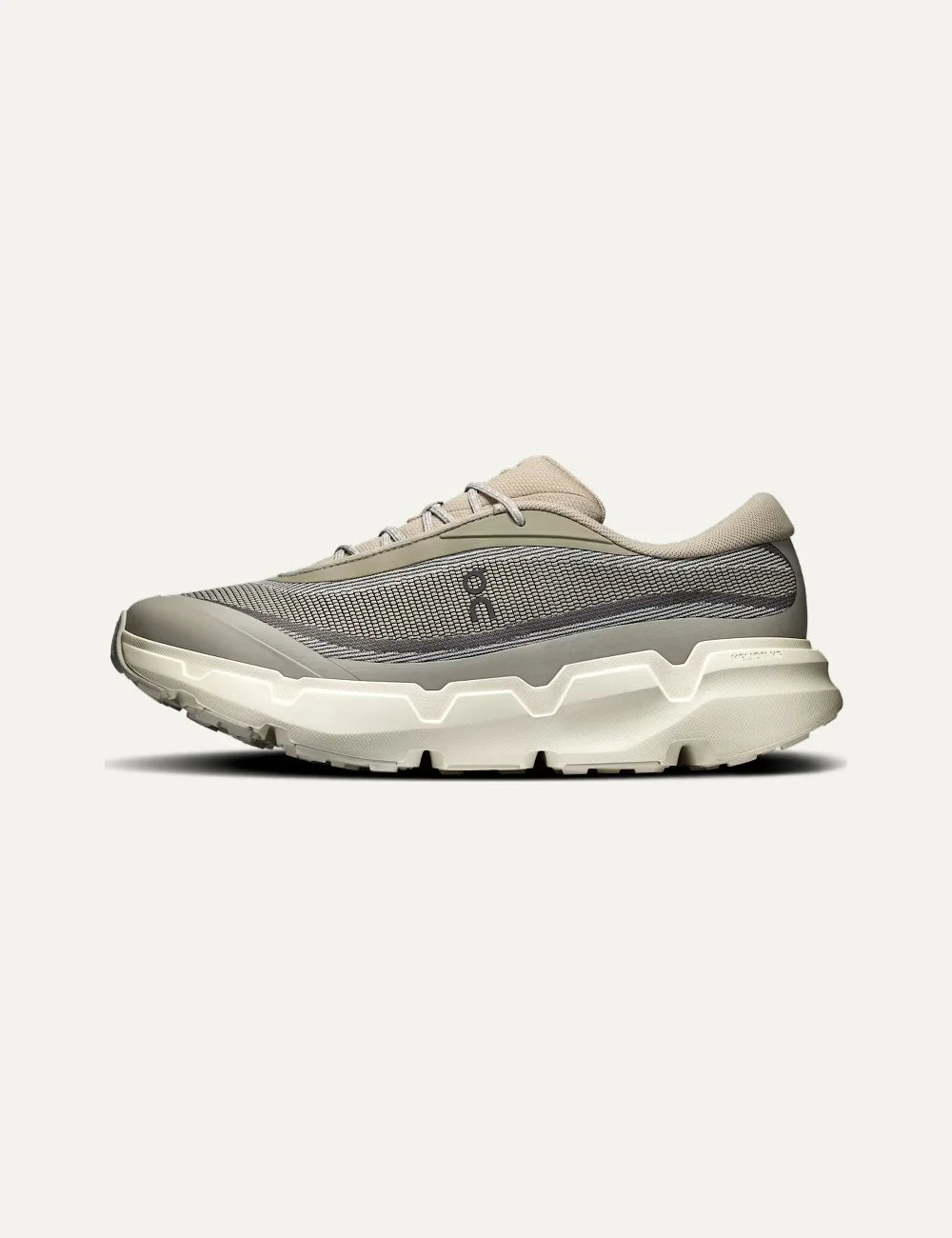 On men's beige and grey hiking sneakers with mesh upper, CloudTec Connect cushioning and Missiongrip outsole side