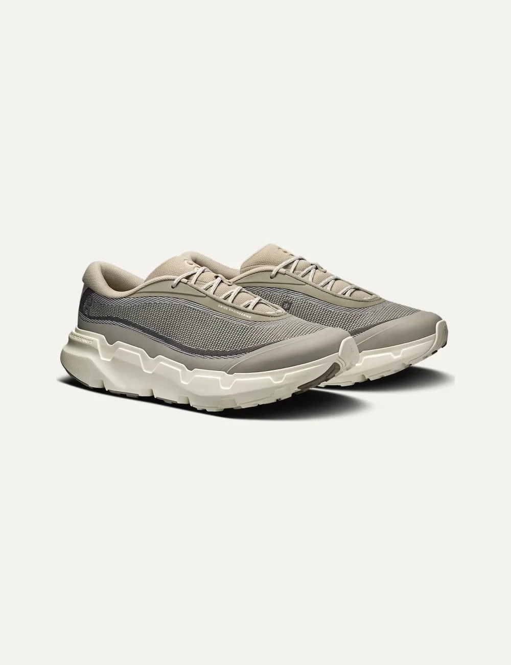 On men's beige and grey hiking sneakers with mesh upper, CloudTec Connect cushioning and Missiongrip outsole profile