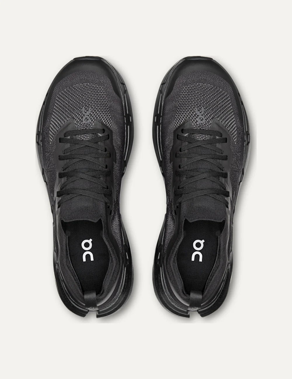 On men's black all-terrain sneakers with textile upper, CloudTec Connect cushioning and Missiongrip outsole top