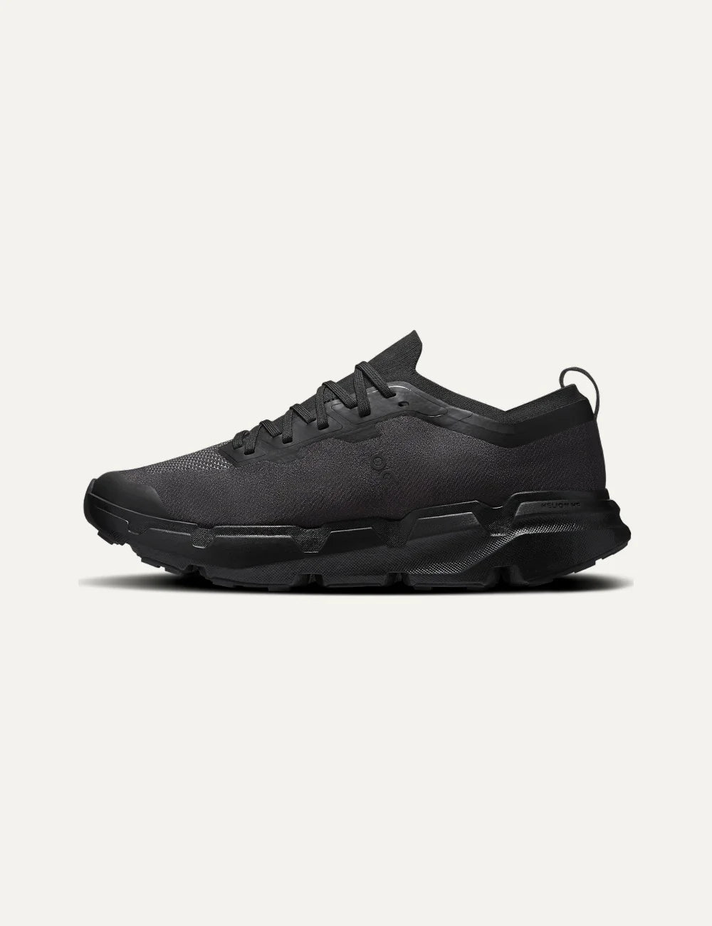 On men's black all-terrain sneakers with textile upper, CloudTec Connect cushioning and Missiongrip outsole side