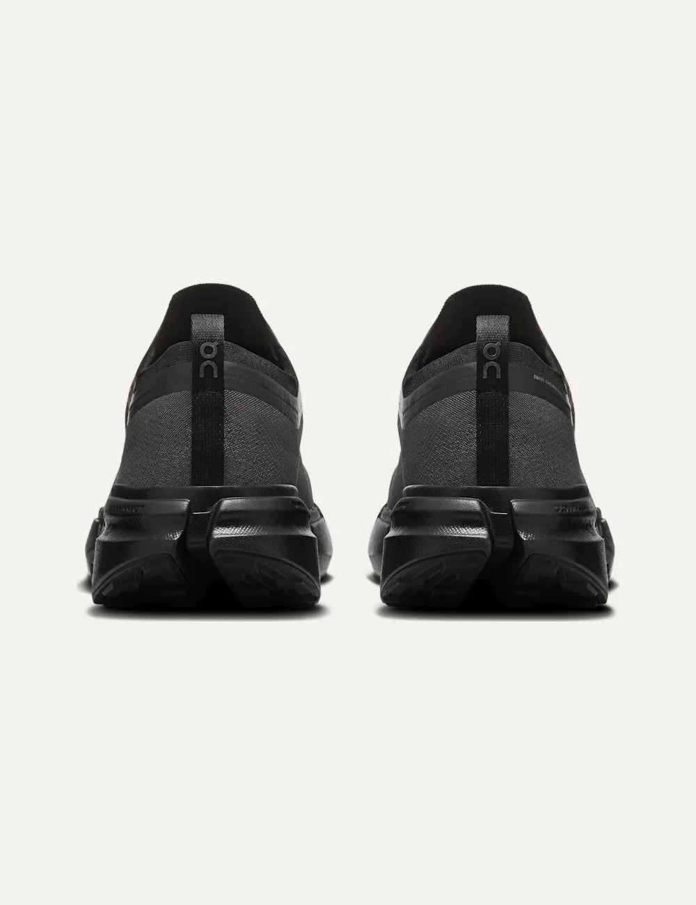 On men's black all-terrain sneakers with textile upper, CloudTec Connect cushioning and Missiongrip outsole back