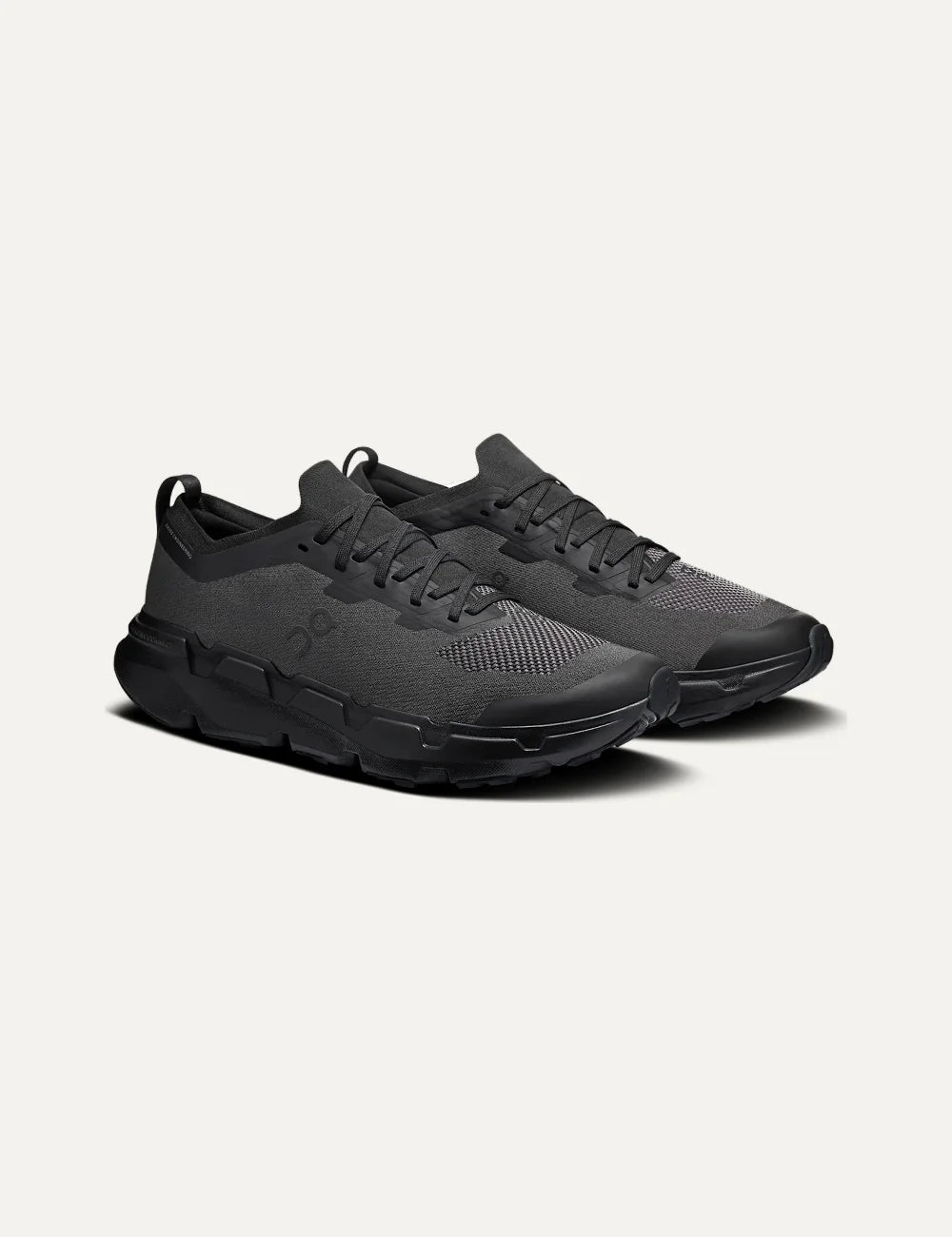 On men's black all-terrain sneakers with textile upper, CloudTec Connect cushioning and Missiongrip outsole profile