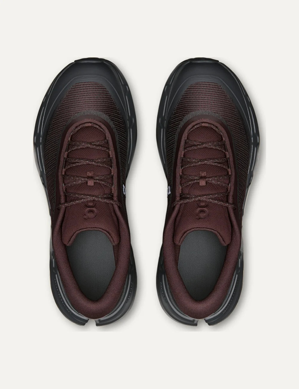 On men's burgundy and dark grey hiking sneakers with mesh upper, CloudTec Connect cushioning and Missiongrip outsole top