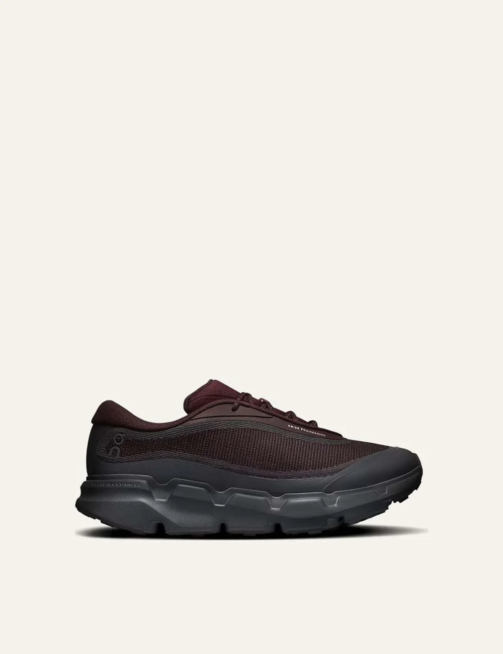 On men's burgundy and dark grey hiking sneakers with mesh upper, CloudTec Connect cushioning and Missiongrip outsole.