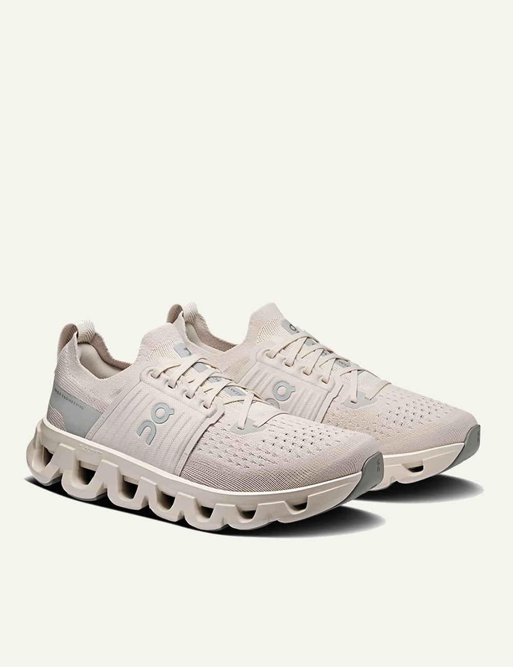 Men's On Cloudrunner 2 beige and grey running sneakers with Helion superfoam and CloudTec cushioning angled