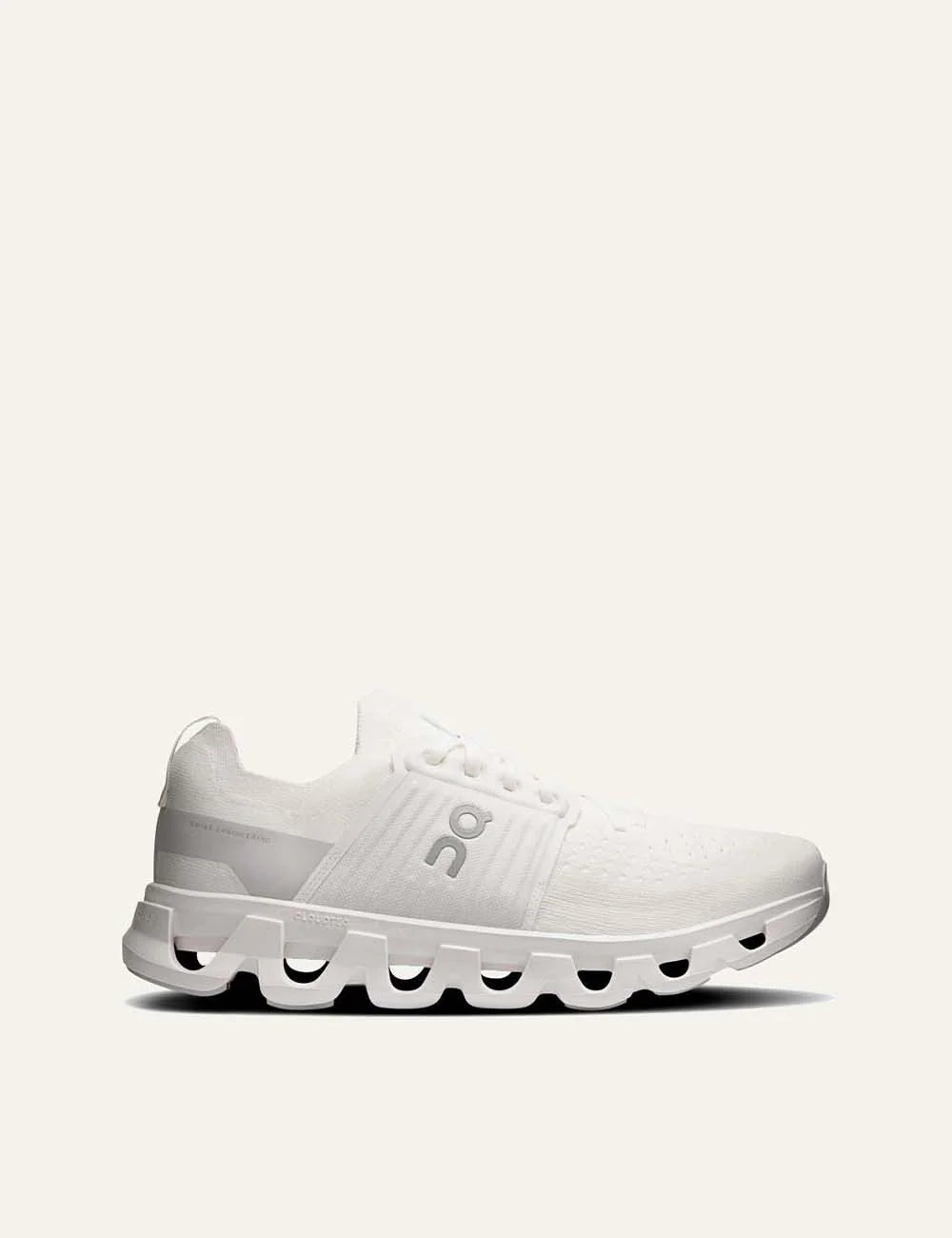 On men's white running sneakers with breathable mesh upper, grey details, CloudTec cushioning and Helion foam.