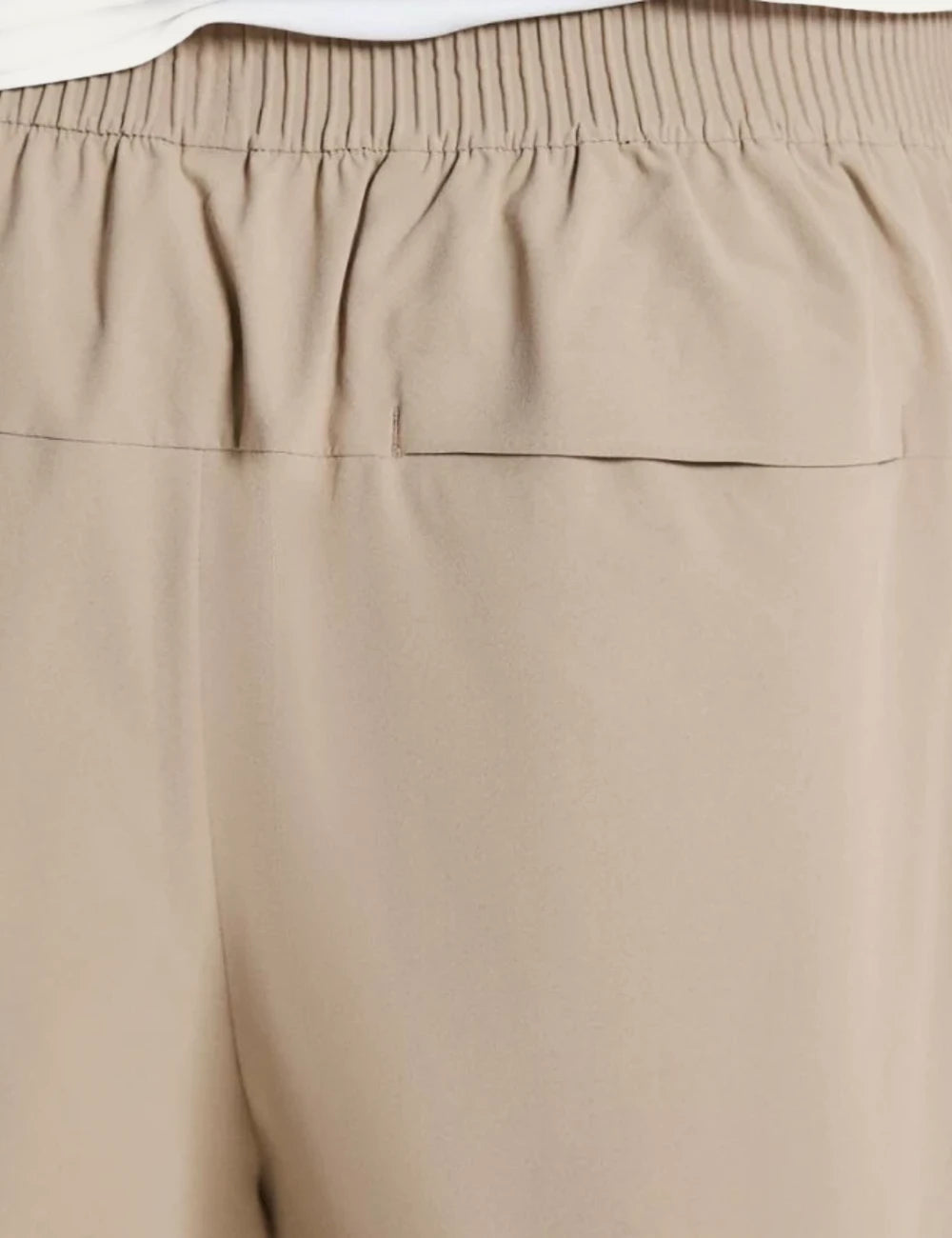On pants beige athleisure elastic waist tapered leg back detail view