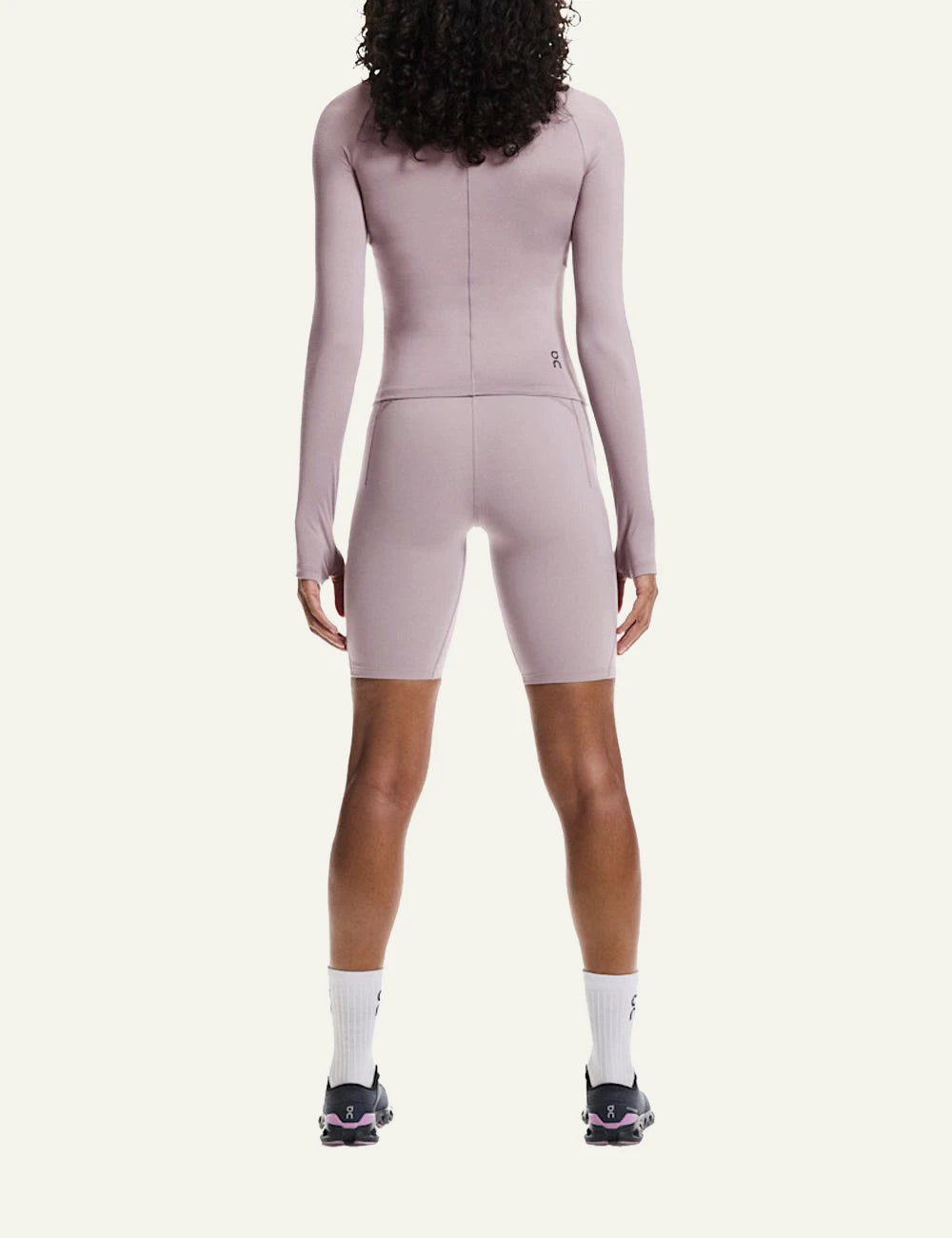 On mauve performance leggings back full body