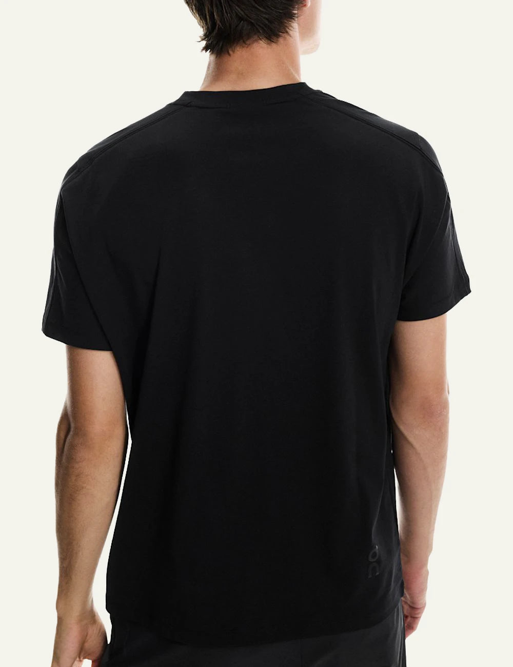 On performance t shirt black back view worn