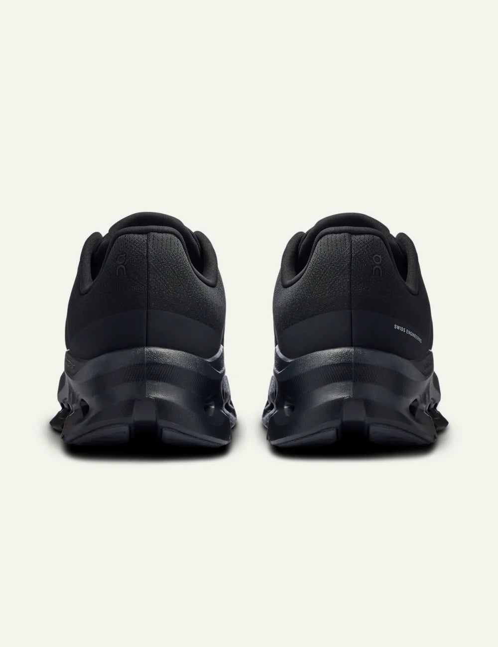 On women's black mesh sneakers with CloudTec Phase cushioned sole back