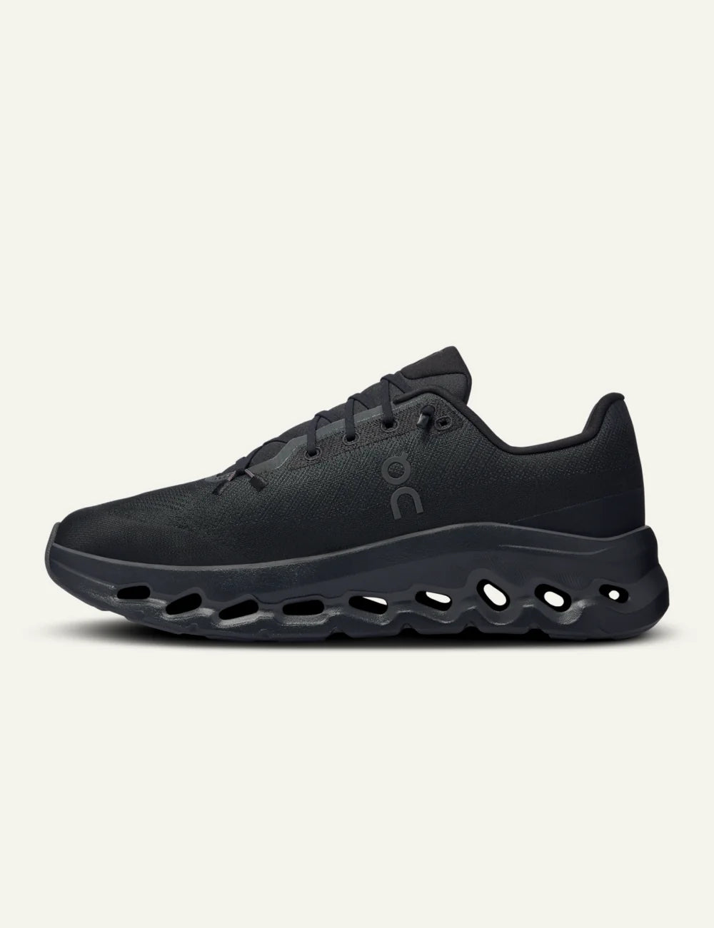 On women's black mesh sneakers with CloudTec Phase cushioned sole profile