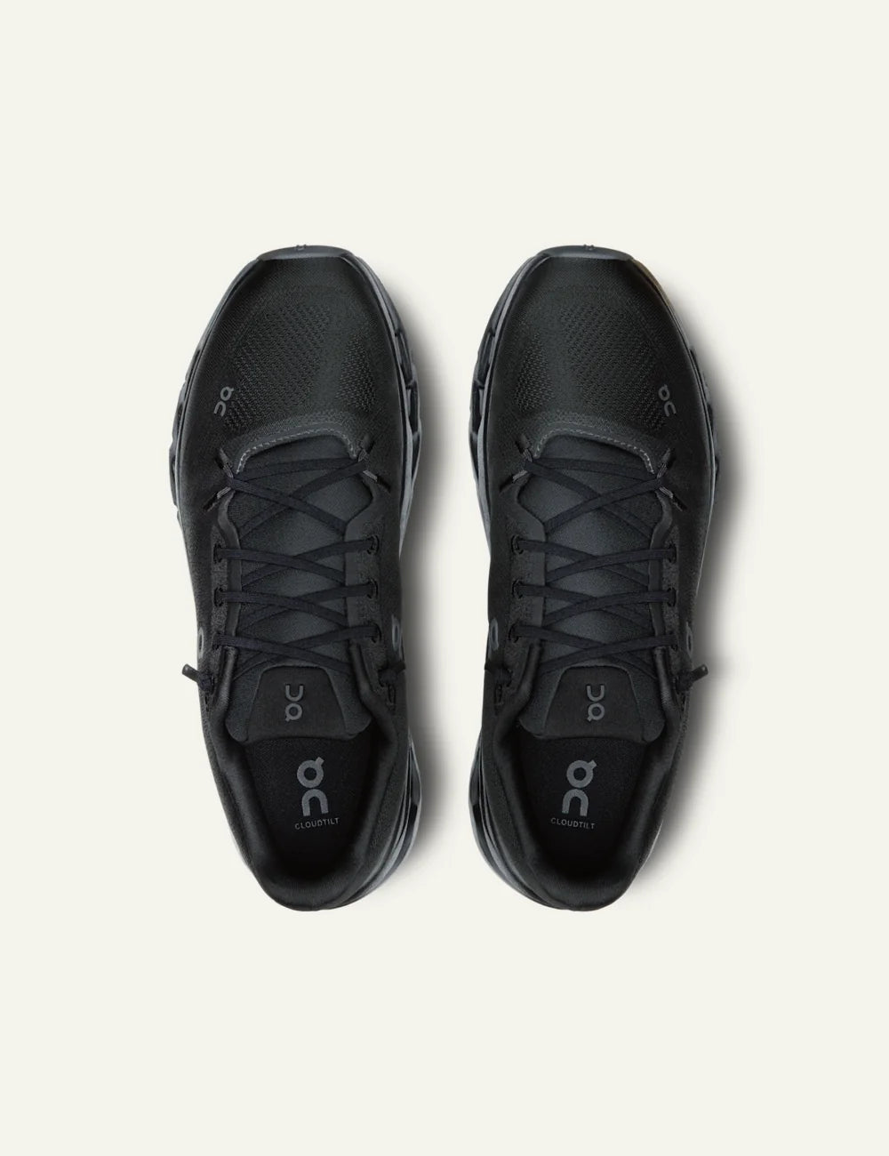 On women's black mesh sneakers with CloudTec Phase cushioned sole top