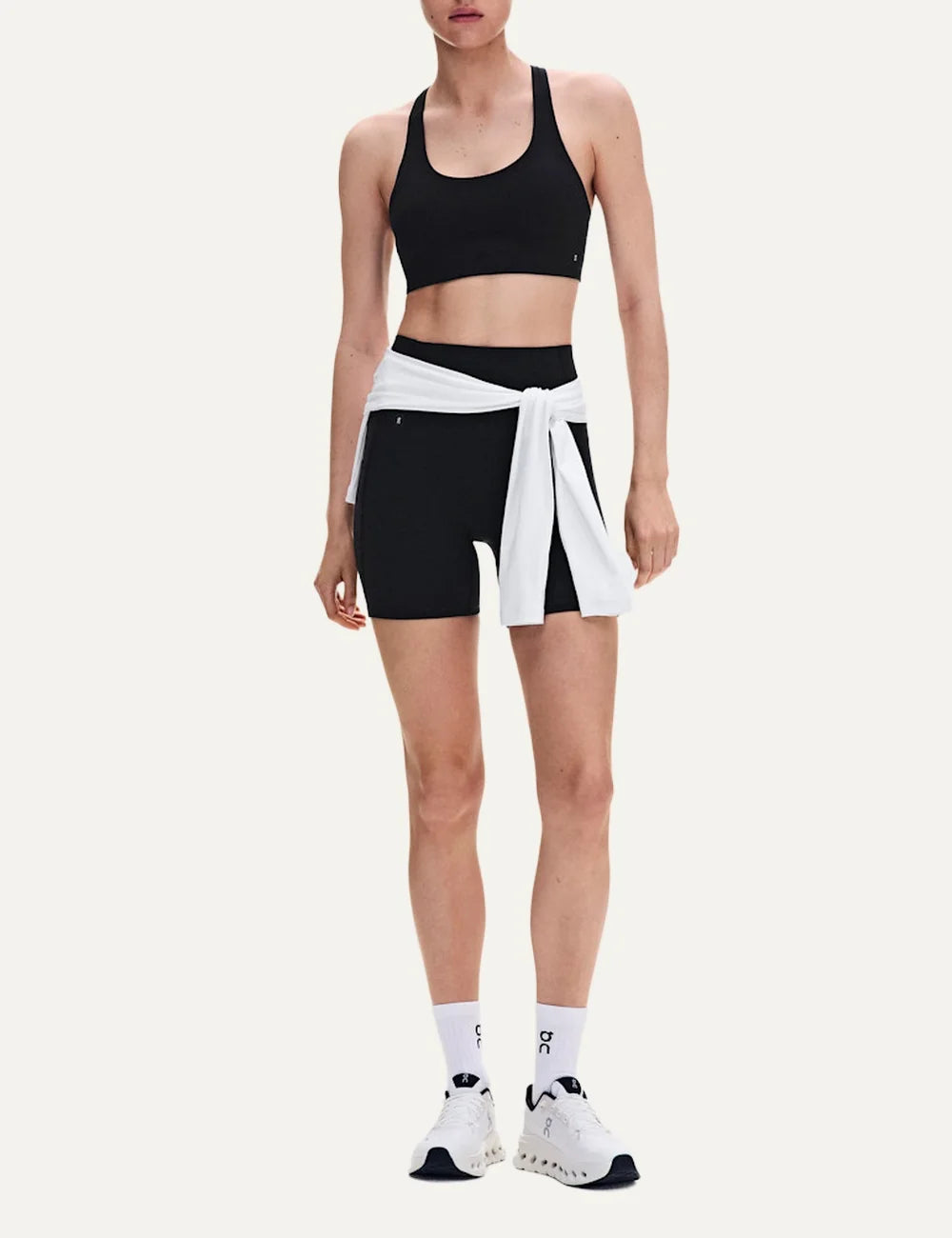 ON women's black racerback sports bra with soft stretch fabric
