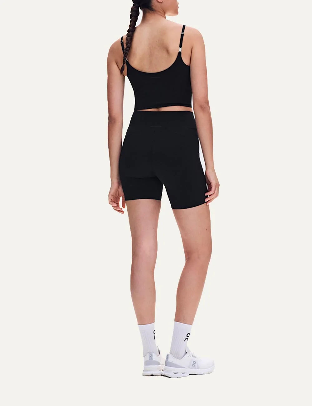 ON women's black soft stretch cropped training top back