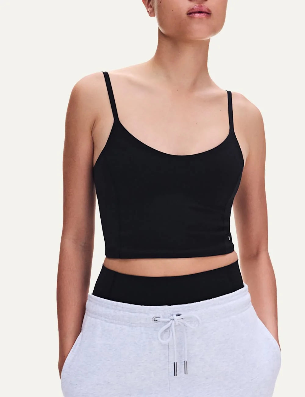 ON women's black soft stretch cropped training top model