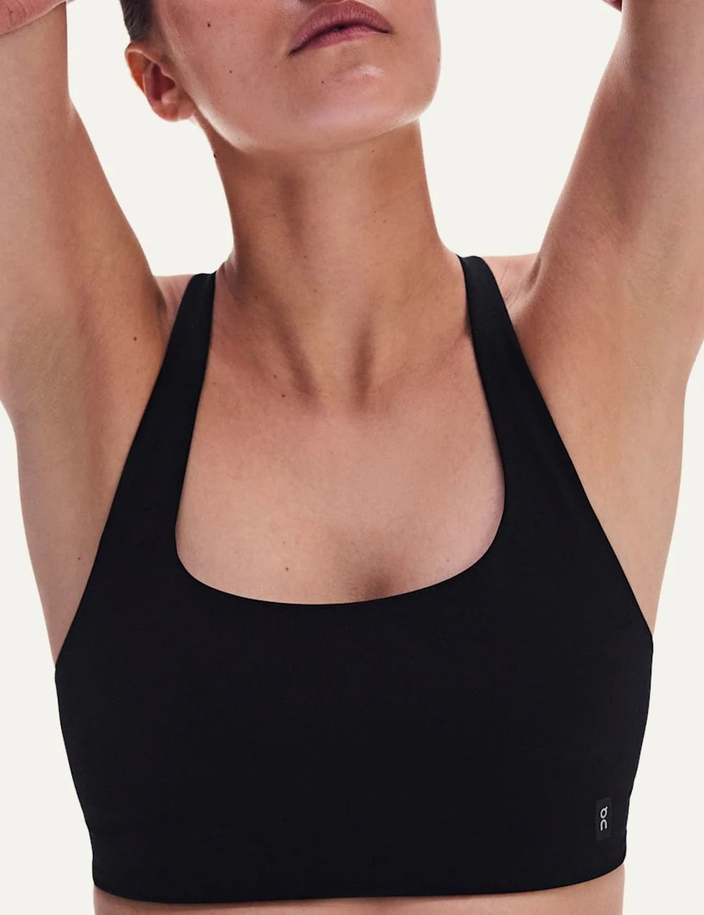 ON women's black soft stretch sports bra with light support detail
