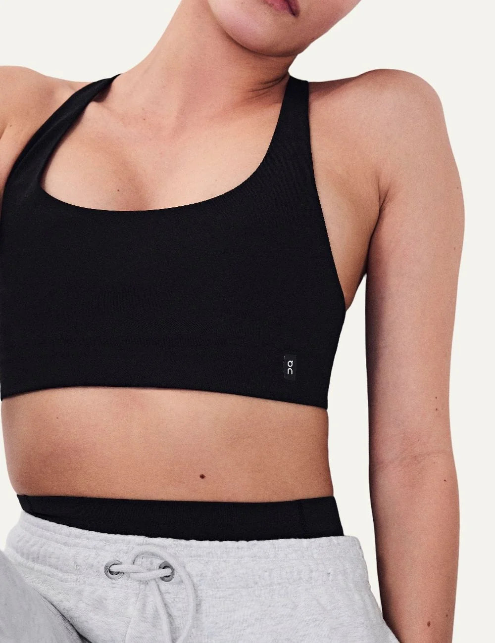 ON women's black soft stretch sports bra with light support model