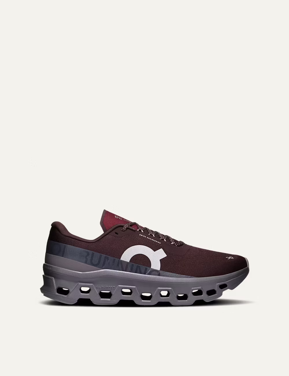 On women's burgundy sneakers with grey CloudTec cushioned sole