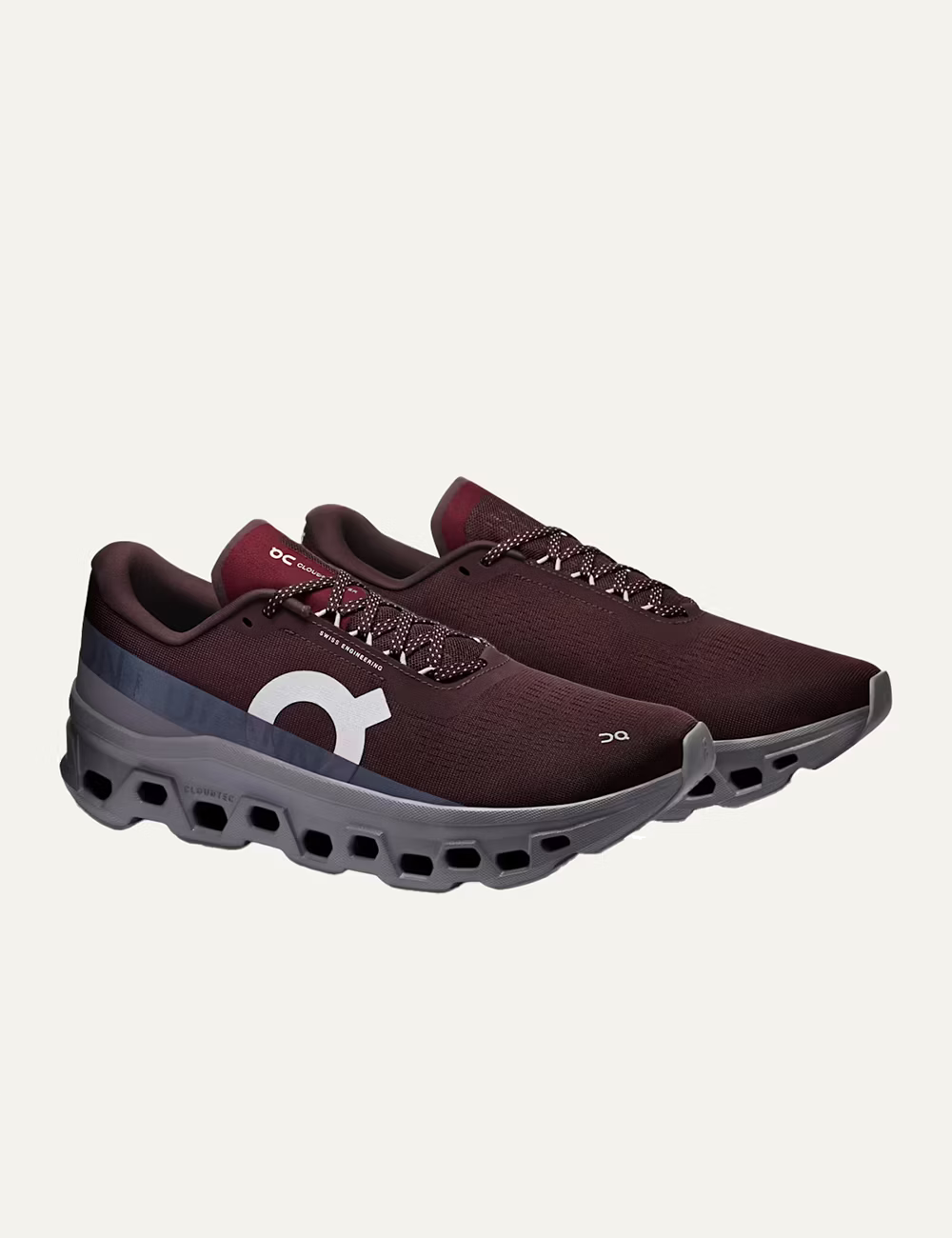 On women's burgundy sneakers with grey CloudTec cushioned sole angled