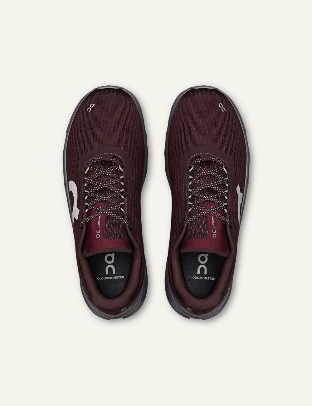 On women's burgundy sneakers with grey CloudTec cushioned sole top