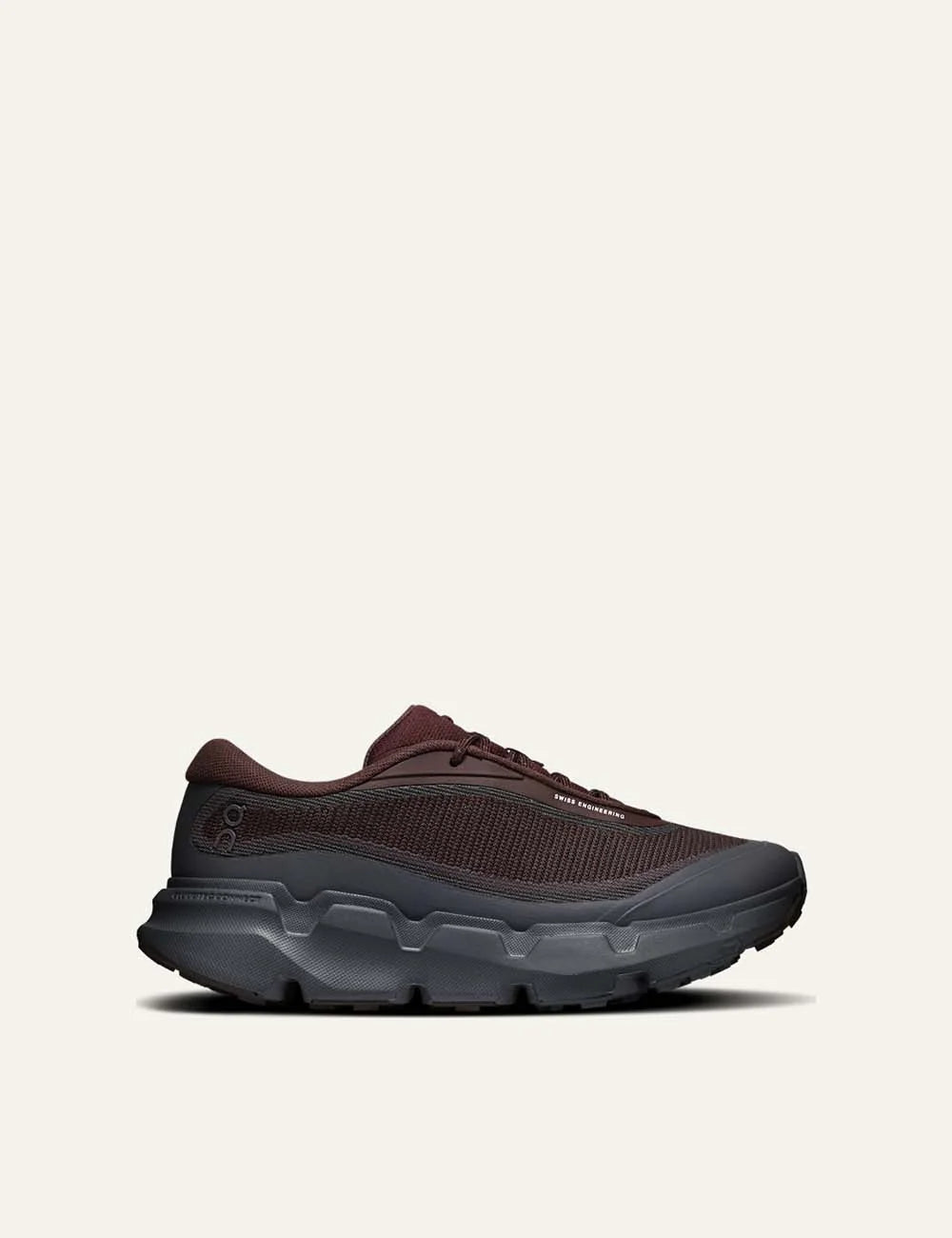 On women's burgundy and dark grey hiking sneakers with mesh upper, CloudTec Connect cushioning and Missiongrip outsole.