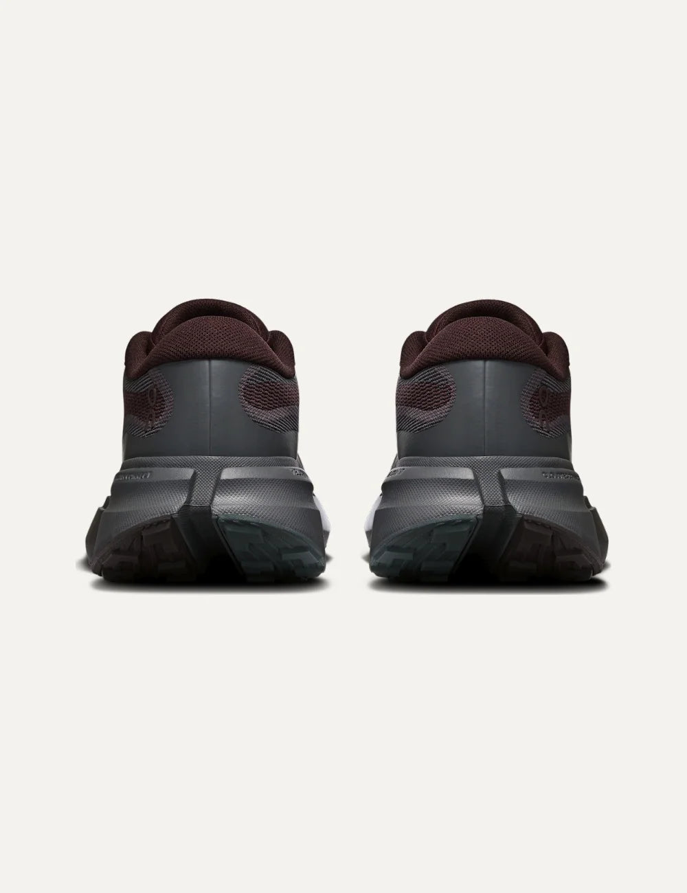 On women's burgundy and dark grey hiking sneakers with mesh upper, CloudTec Connect cushioning and Missiongrip outsole back