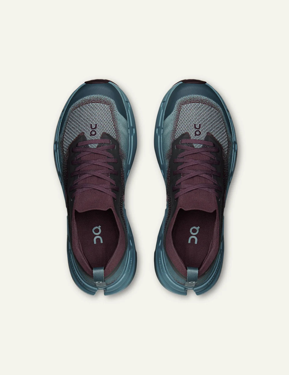On women's burgundy and light blue technical knit running sneakers top