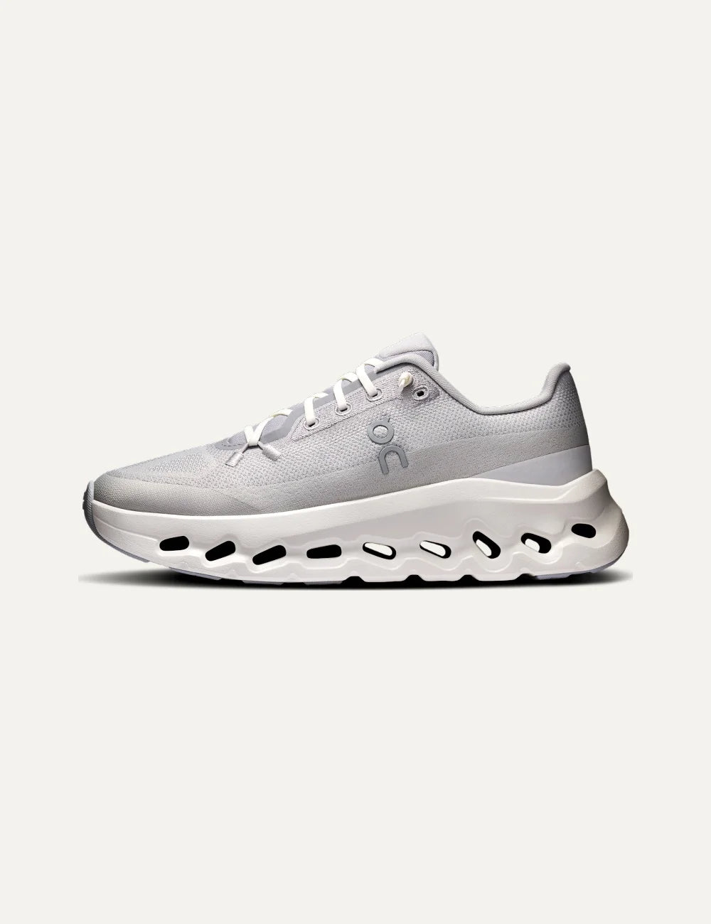 On women's grey Cloudsurfer sneakers with textile upper, speed laces and white CloudTec Phase cushioned sole rofile