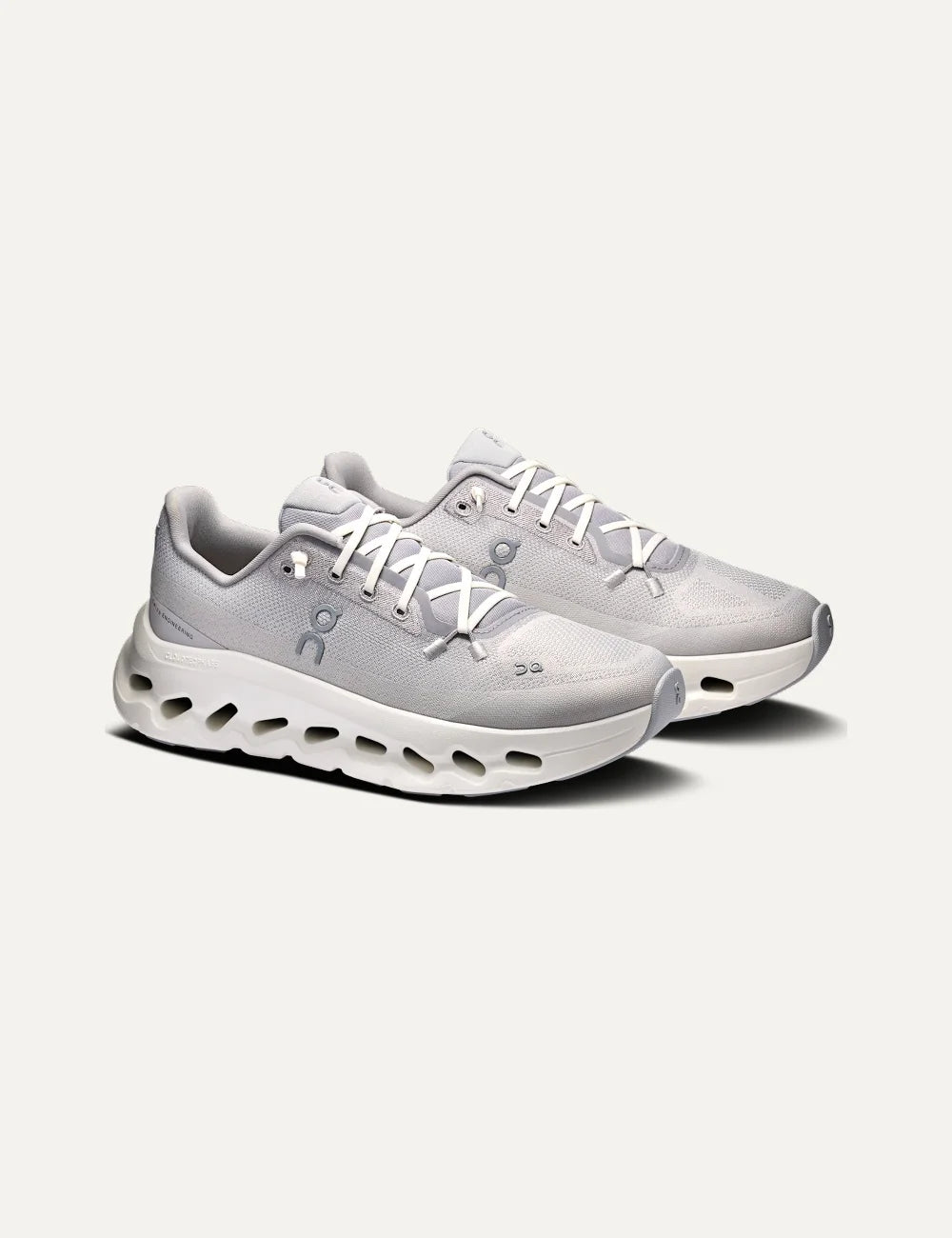 On women's grey Cloudsurfer sneakers with textile upper, speed laces and white CloudTec Phase cushioned sole angled