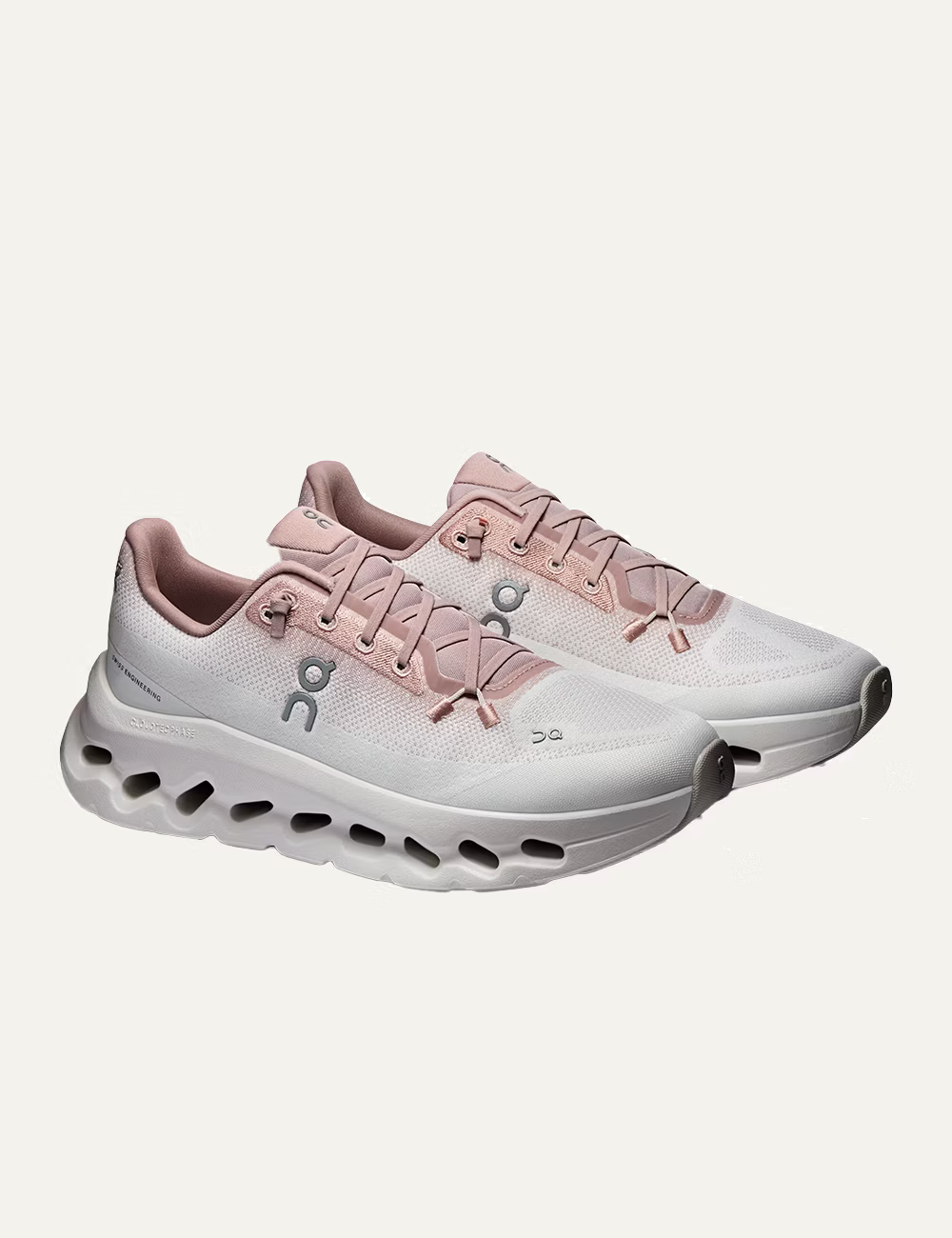 Women's On Cloudtilt Biscuit Ivory pink and white running sneakers with CloudTec Phase cushioning angled