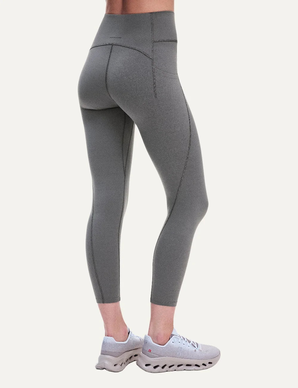 ON women's grey brown high-waisted 7/8 stretch training leggings back detail