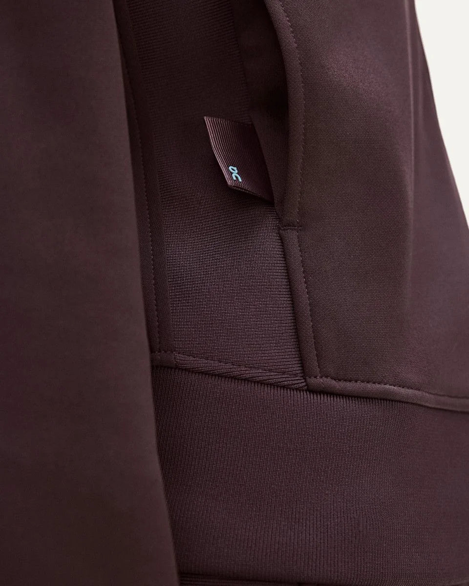 On women's Mulberry brown full-zip tennis-inspired jacket detail