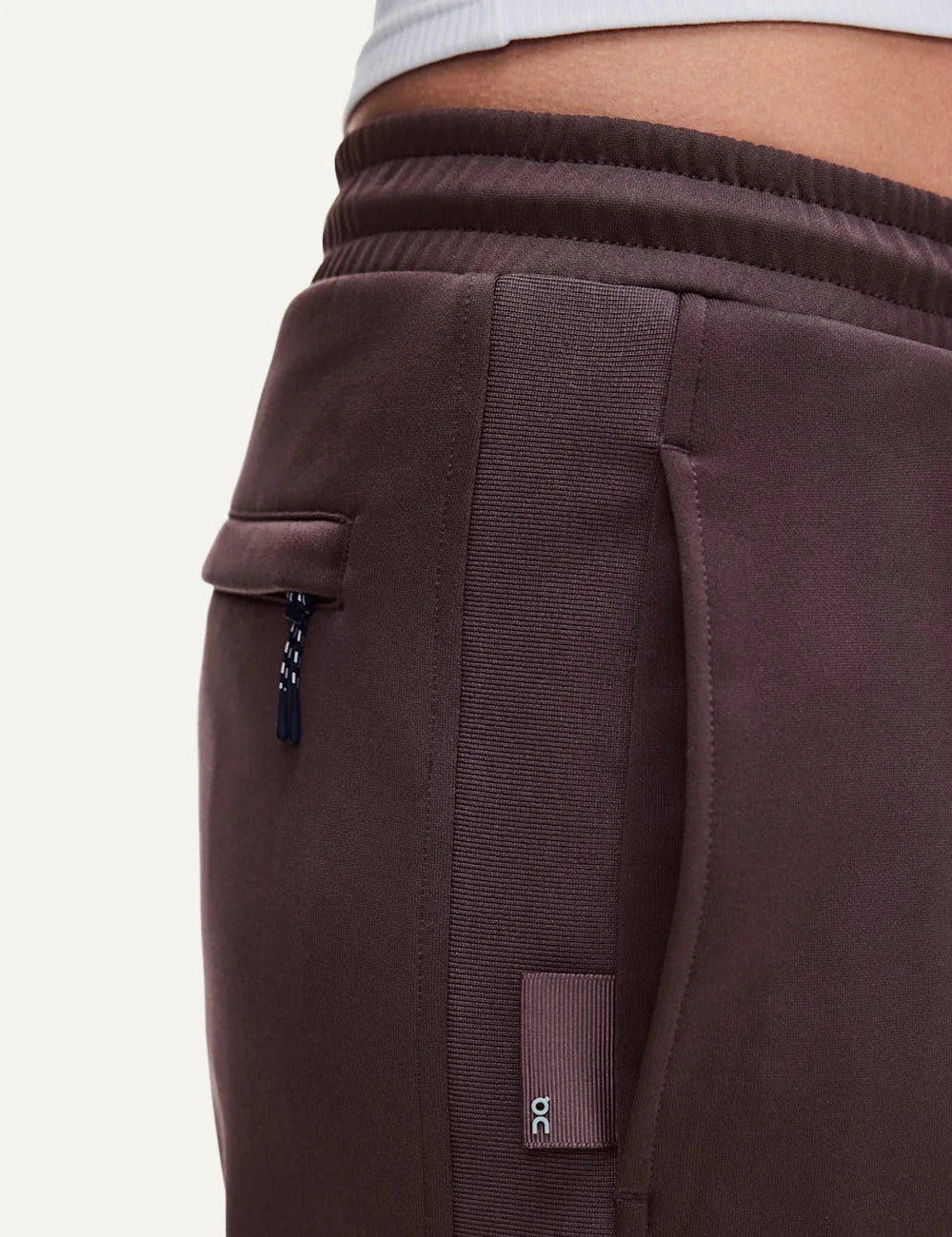 ON women's Mulberry brown tennis-inspired pants with elastic waist detail