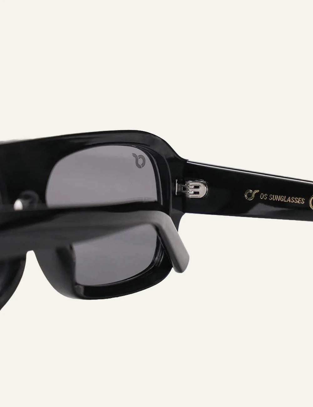 os sunglasses rectangular black frame green lens detail view