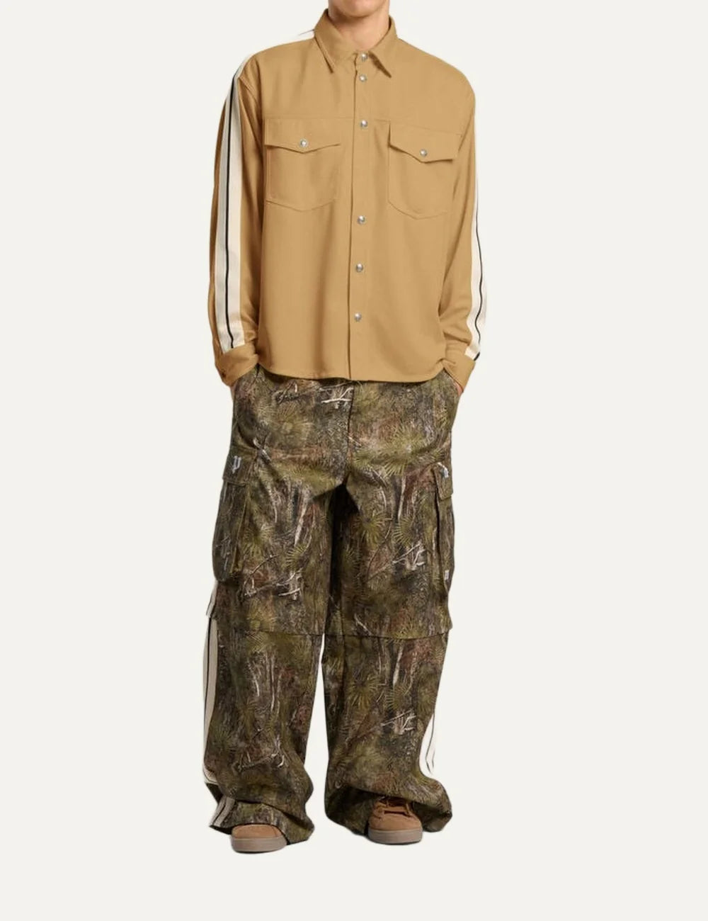 Palm Angels men's beige technical jersey shirt with white and black sleeve stripes, metal snap-button front, pointed collar and two flap chest pockets full body