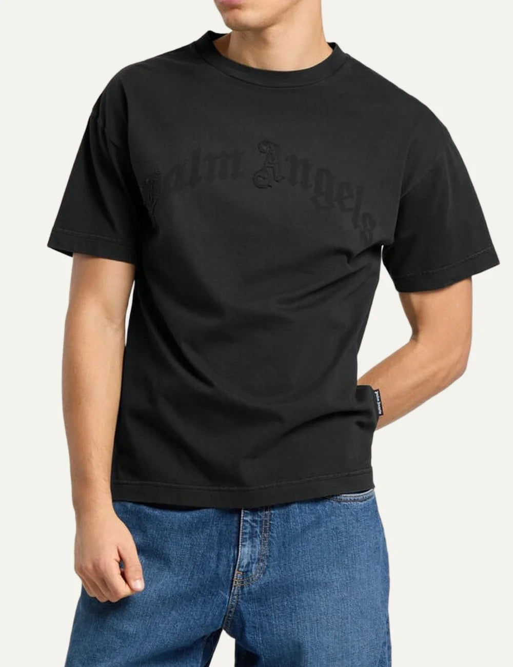 Palm Angels men's black cotton crew neck T-shirt with short sleeves and tonal black arched gothic logo patch embroidered across the chest model