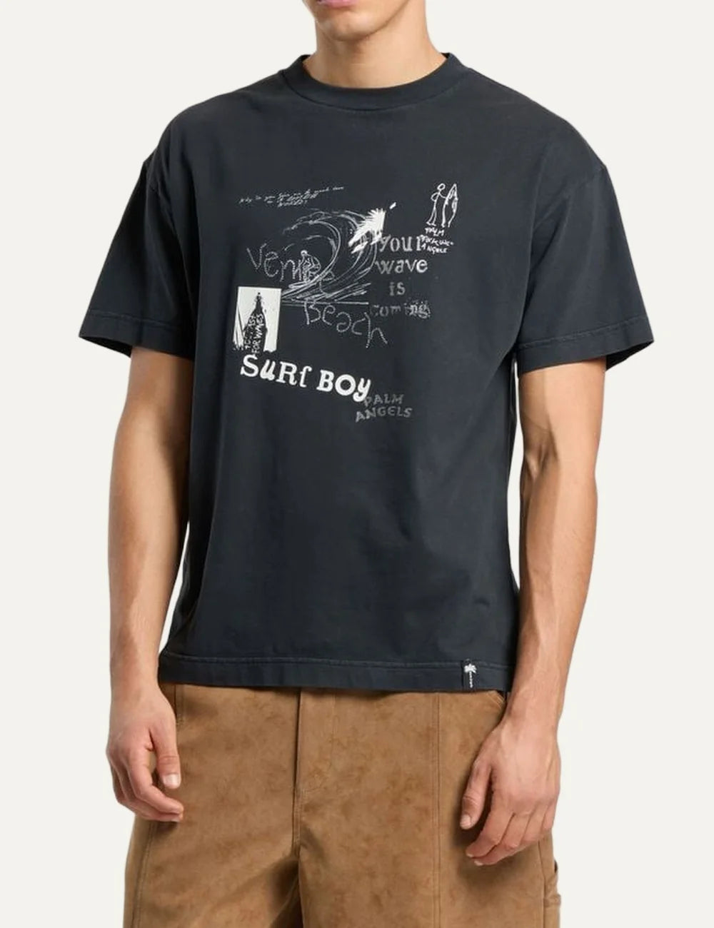 Palm Angels men's washed black cotton T-shirt with white hand-drawn surf graphics, wave illustration, Venice Beach and Surf Boy lettering on the chest model