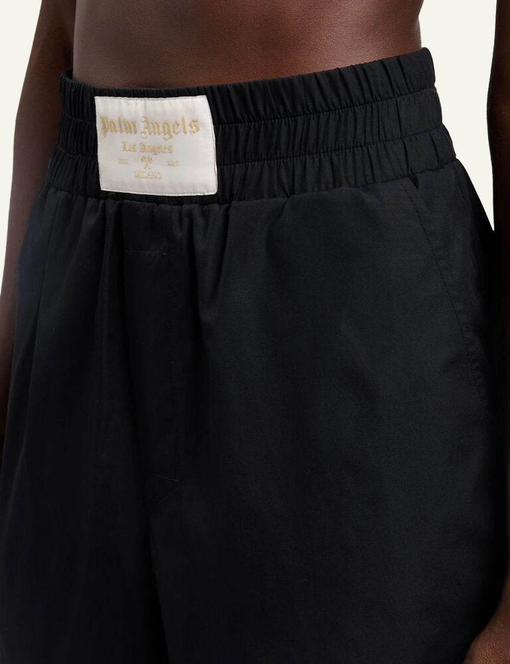 Palm Angels shorts black piping hem elastic waist front detail view