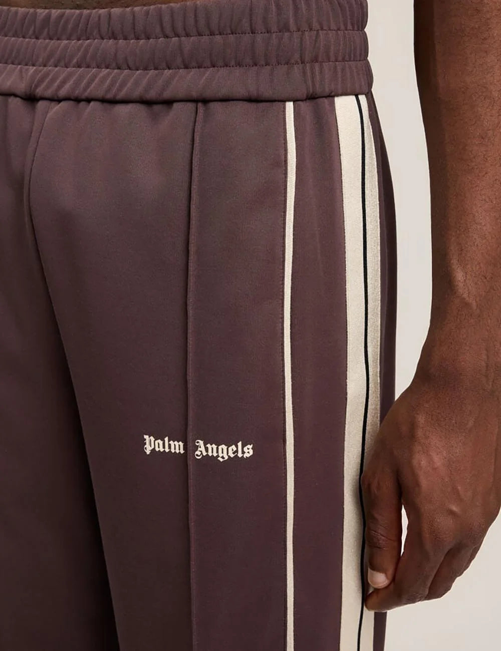 palm angels track pants brown stripe logo front logo view