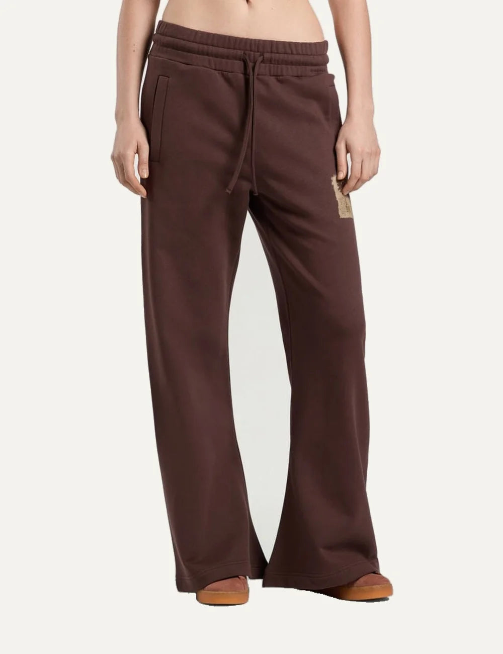 Women's Palm Angels brown cotton sweatpants with wide flared legs, drawstring waist and brushed palm tree logo print model