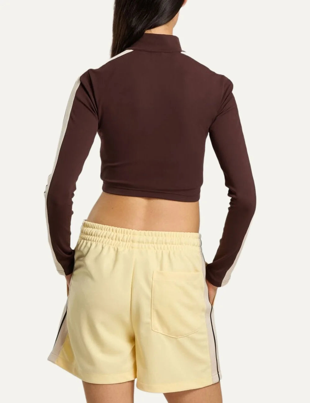 Palm Angels women's dark brown cropped track jacket with cream sleeve stripes, high stand collar, two-way front zipper and logo on the chest back