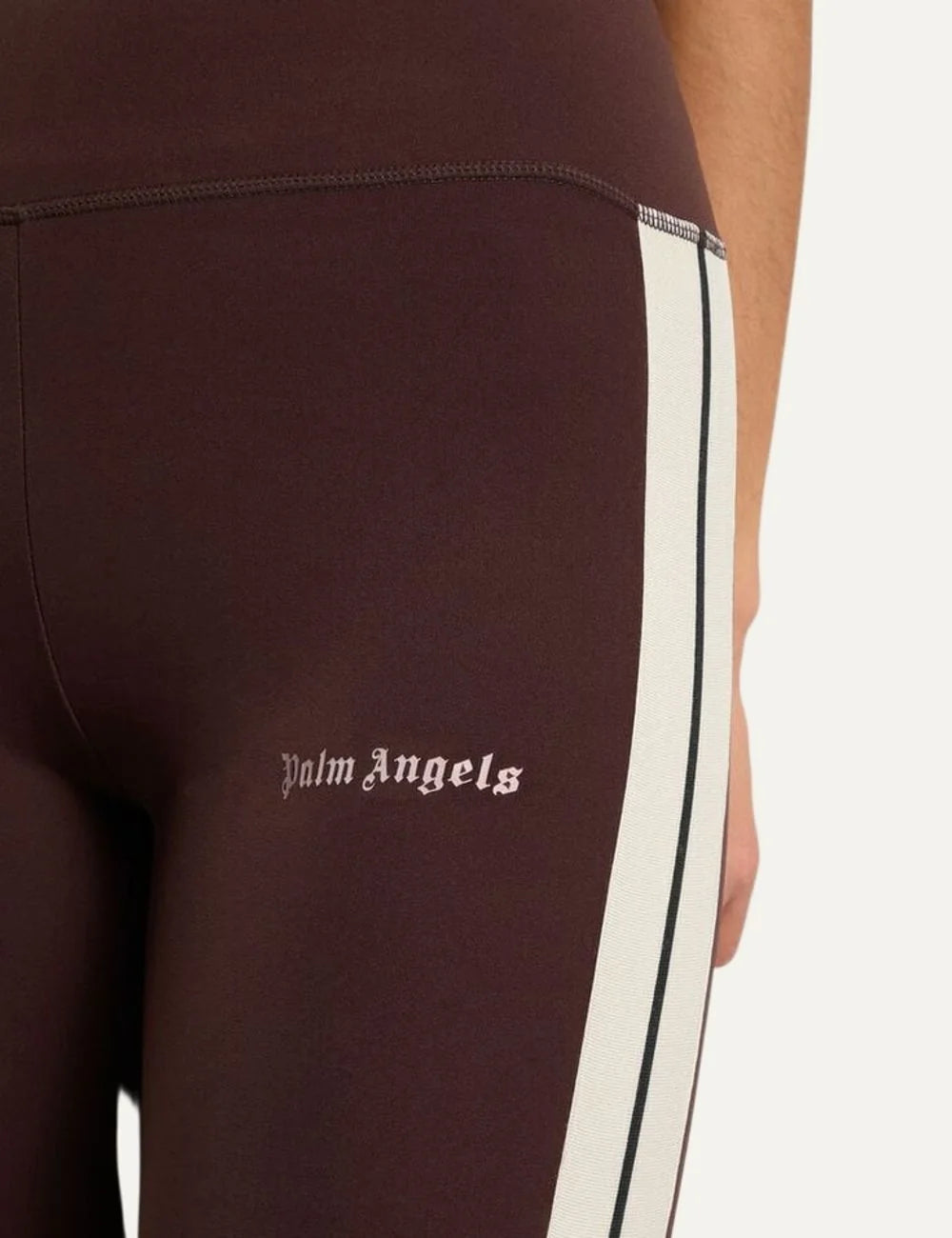 Palm Angels women's dark brown high-waisted leggings with cream side stripes, a wide waistband and white gothic logo on the front thigh detail
