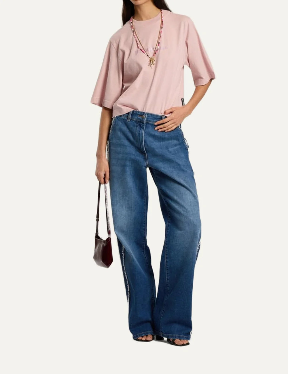 Palm Angels women's light pink cotton boxy T-shirt with sparkling rhinestone gothic logo on the chest, ribbed crew neck and wide short sleeves full body