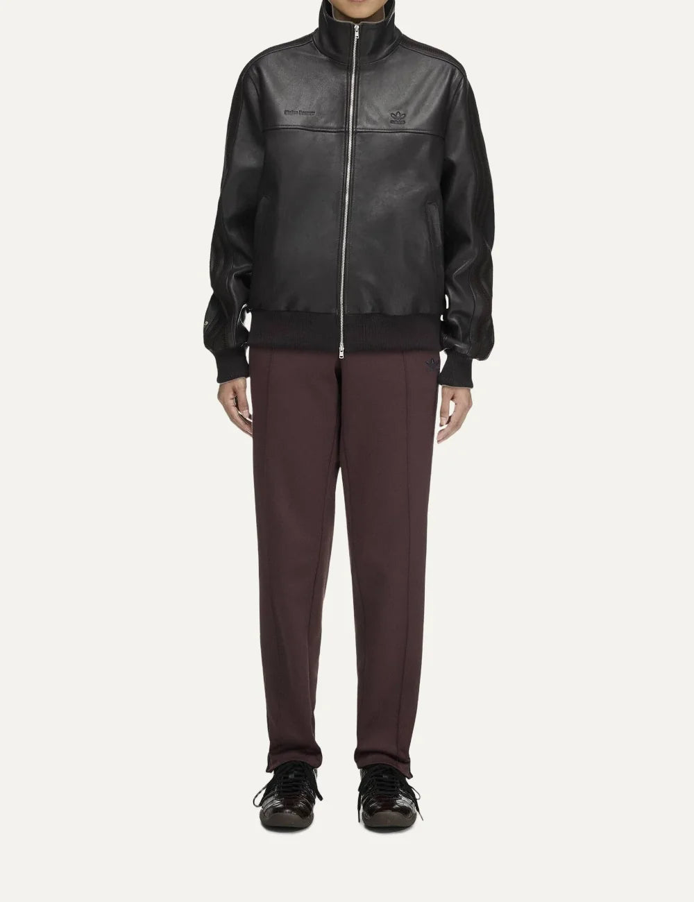 Women's Adidas Originals x Wales Bonner slim fit burgundy track pants with navy side stripes, Trefoil logo, front seams and stirrup hems. full look