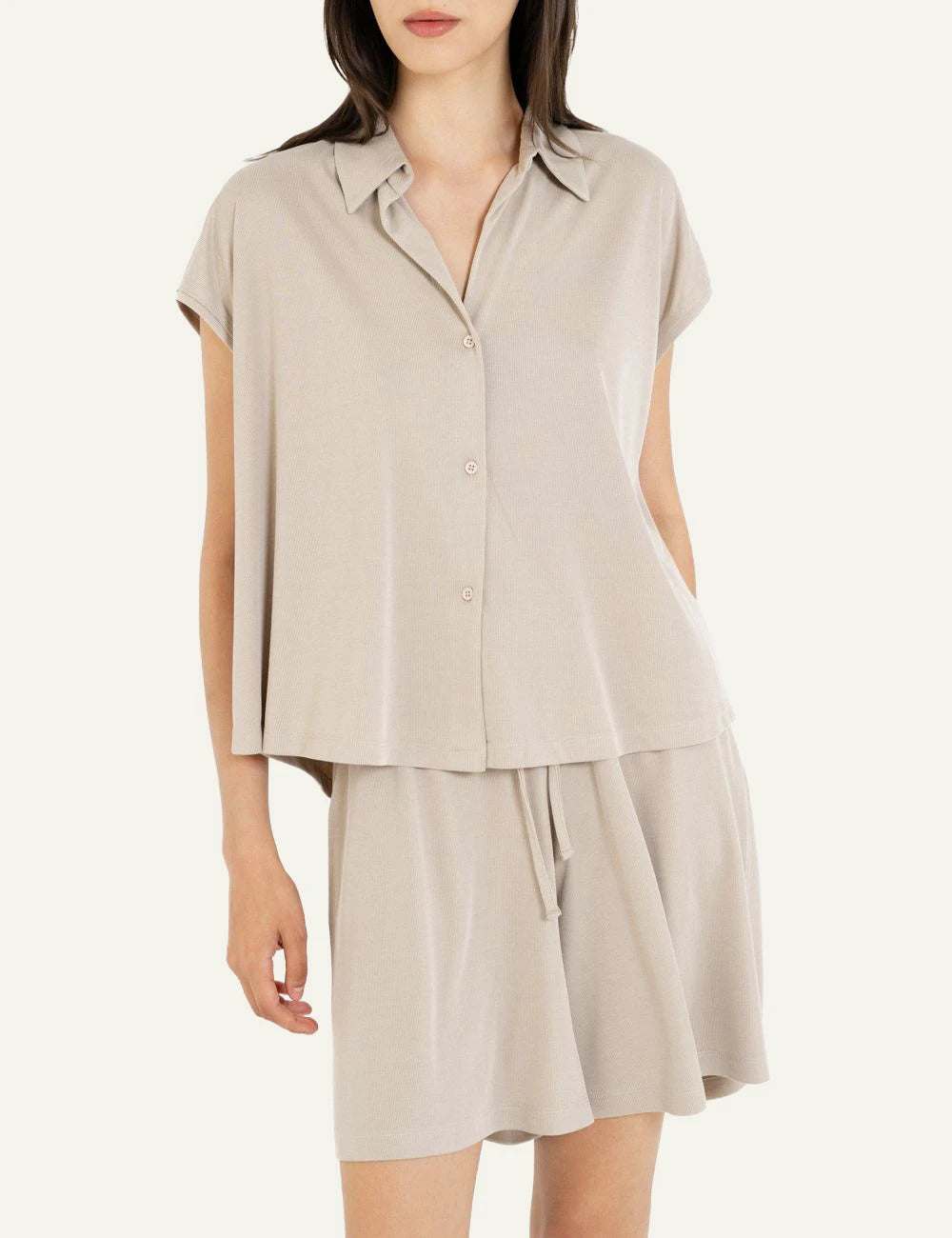 Philosophy beige ribbed sleeveless shirt button front view model