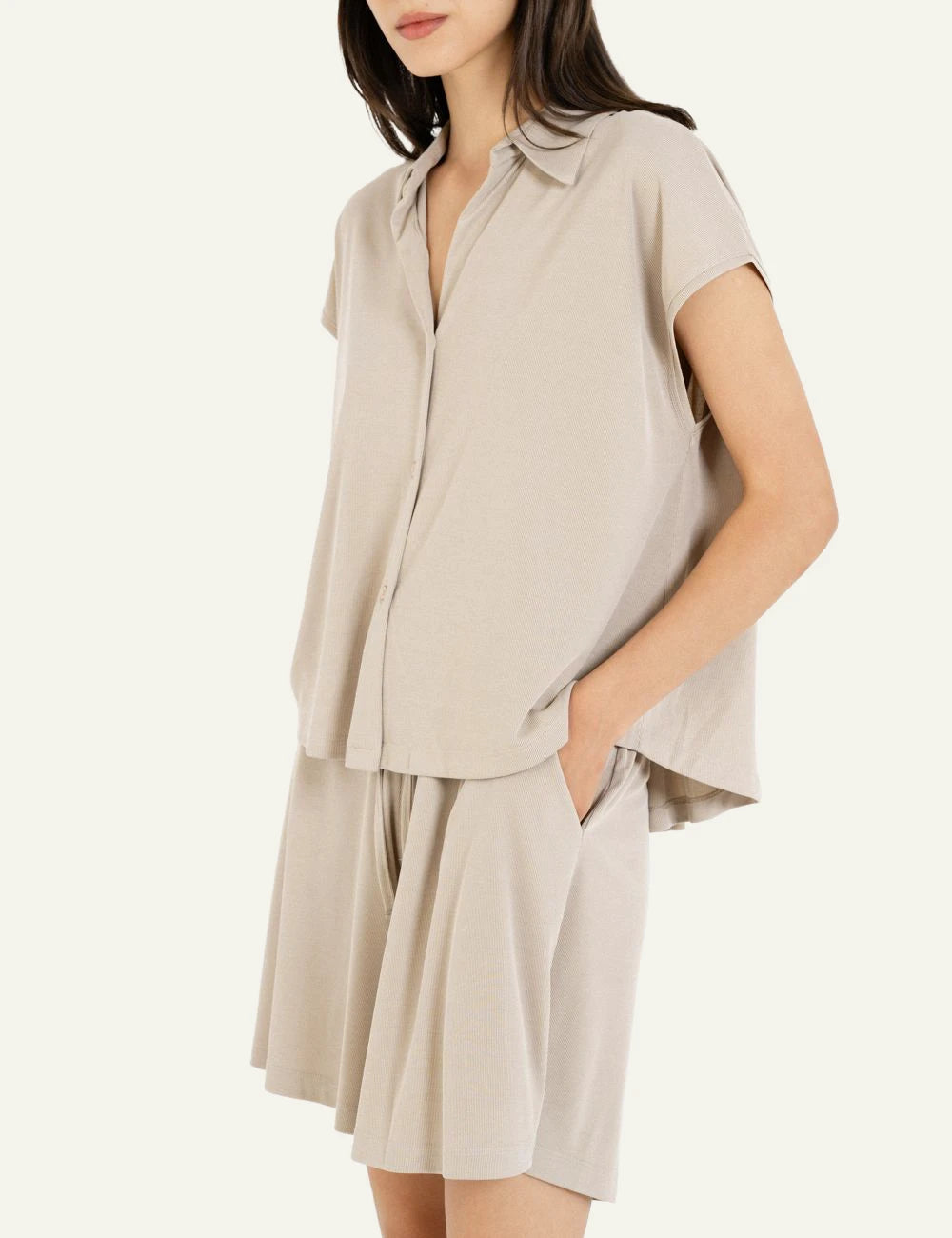 Philosophy beige ribbed sleeveless shirt button side model